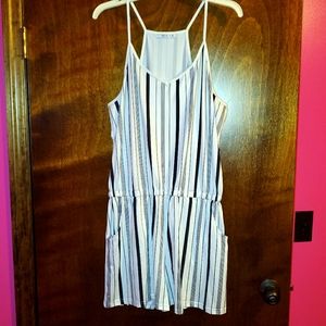 Black & White striped romper with pockets.